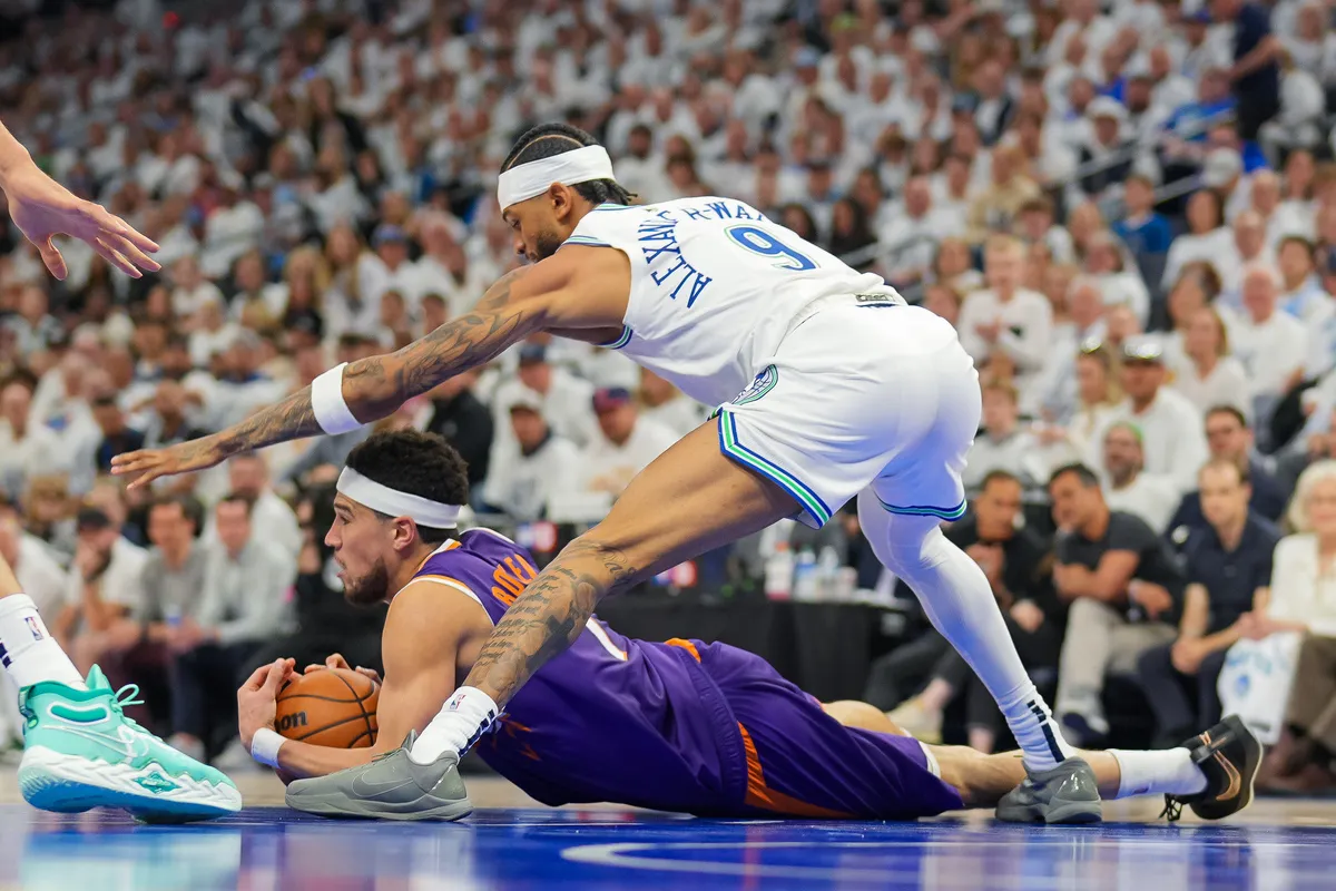 Nickeil Alexander-Walker avec les Wolves