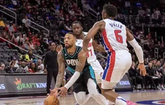 Damian Lillard voit triple à Detroit