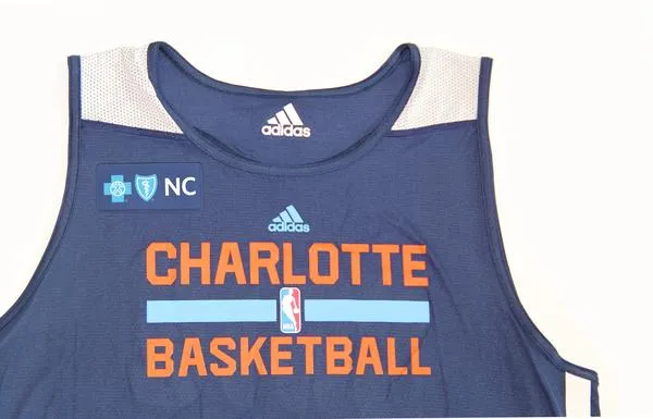 Charlotte Bobcats publicité sur maillot