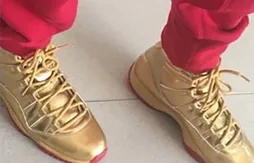 Des Air Jordan 11 or et rouge pour Michael Finley