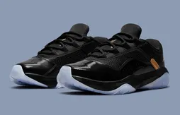 Une Air Jordan 11 Low parée de noir et d’or