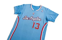 Des pavillons nautiques sur le maillot à manches des Clippers