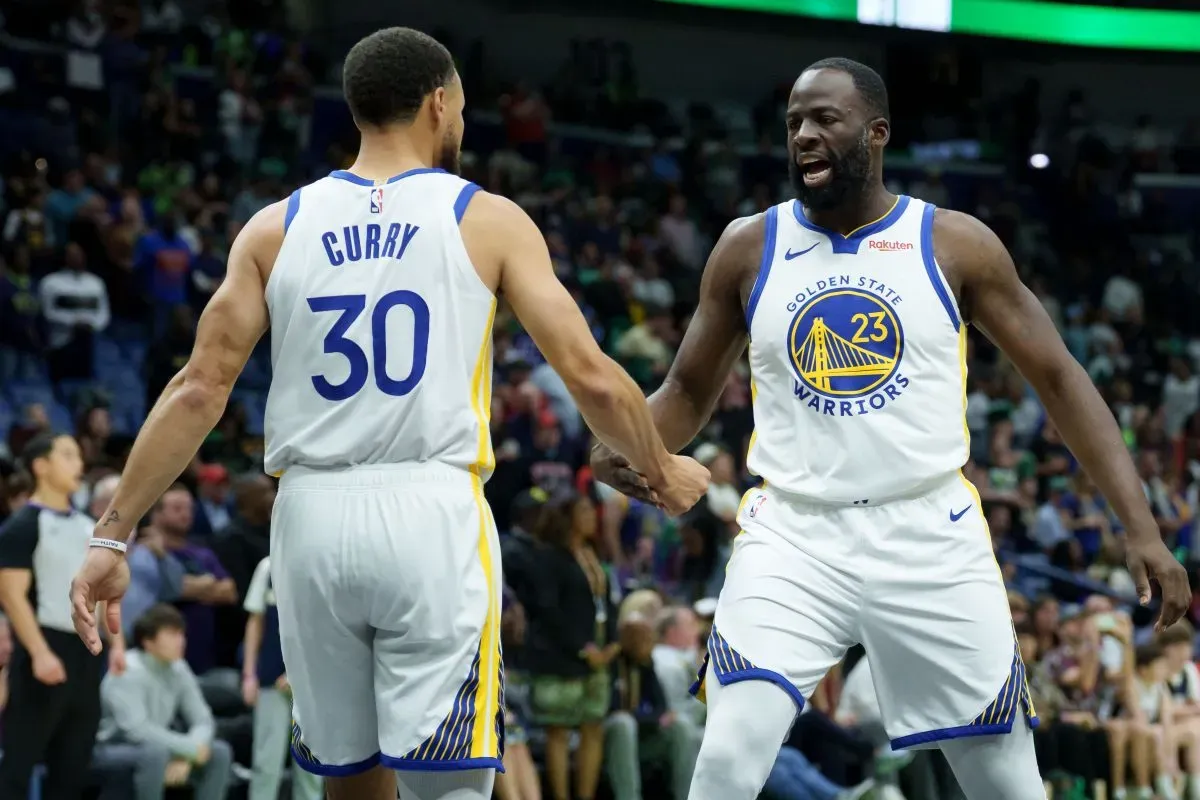 Stephen Curry et Draymond Green avec les Warriors