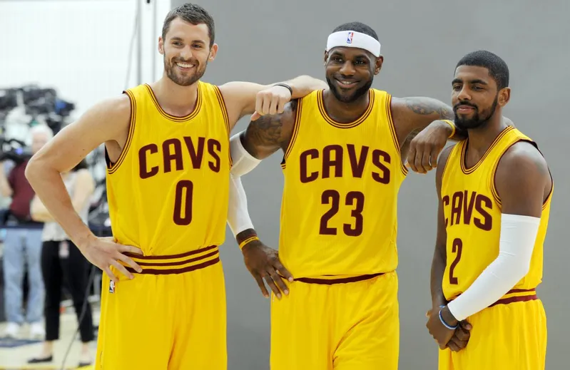 Sep 26, 2014; Cleveland, OH, USA; Cleveland Cavaliers forward Kevin Love (0), forward LeBron James (23) and guard Kyrie Irving (2) pose for a photo during media day at Cleveland Clinic Courts. Mandatory Credit: Ken Blaze-USA TODAY Sports ORG XMIT: USATSI-189412 ORIG FILE ID: 20140926_jla_bk4_344.jpg