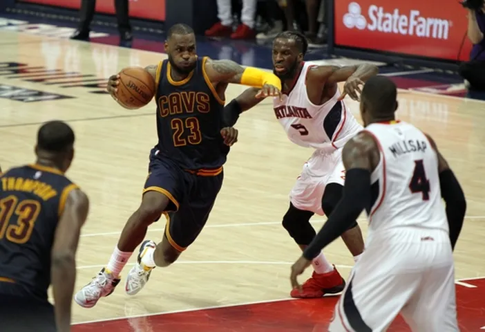 May 20, 2015; Atlanta, GA, USA; Cleveland Cavaliers forward LeBron James (23) drives against Atlanta Hawks forward DeMarre Carroll (5) during the third quarter of game one of the Eastern Conference Finals of the NBA Playoffs at Philips Arena. Mandatory Credit: Brett Davis-USA TODAY Sports