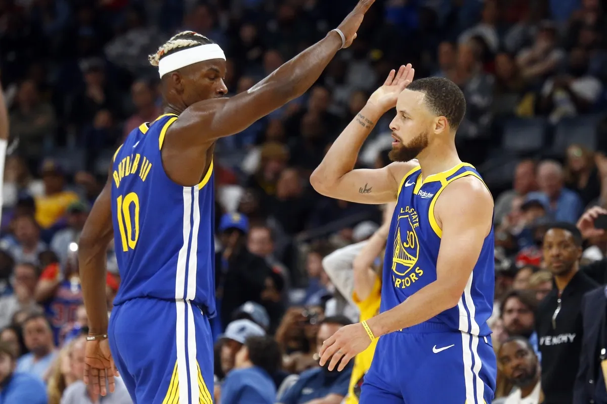 Jimmy Butler et Stephen Curry avec les Warriors