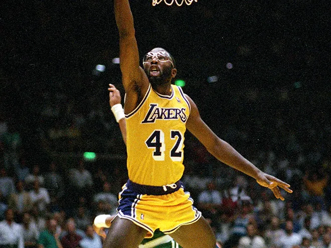** FILE ** Los Angeles Lakers' James Worthy goes up for a basket against the Boston Celtics in the NBA finals at The Forum in Inglewood, Ca., in this June 3, 1987 photo. Worthy and Robert Parish led a group of seven players, coaches and broadcasters elected Monday, April 7, 2003  to the Naismith Memorial Basketball Hall of Fame.(AP Photo/Lennox Mclendon) ORG XMIT: NY158