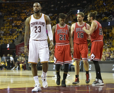May 4, 2015; Cleveland, OH, USA; Cleveland Cavaliers forward LeBron James (23) reacts beside Chicago Bulls guard Jimmy Butler (21), forward Pau Gasol (16) and center Joakim Noah (13) in the third quarter in game one of the second round of the NBA Playoffs at Quicken Loans Arena. Mandatory Credit: David Richard-USA TODAY Sports