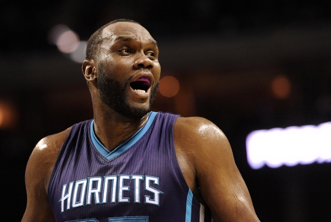 Nov 5, 2014; Charlotte, NC, USA; Charlotte Hornets center Al Jefferson (25) yells at Miami Heat forward Udonis Haslem (40) (not pictured) during the second half of the game at Time Warner Cable Arena. Hornets win 96-89. Mandatory Credit: Sam Sharpe-USA TODAY Sports