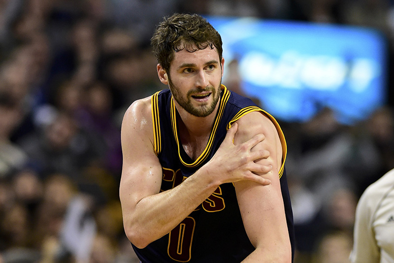 Apr 26, 2015; Boston, MA, USA; Cleveland Cavaliers forward Kevin Love (0) injures his shoulder during the first half in game four of the first round of the NBA Playoffs against the Boston Celtics. at TD Garden. Mandatory Credit: Bob DeChiara-USA TODAY Sports