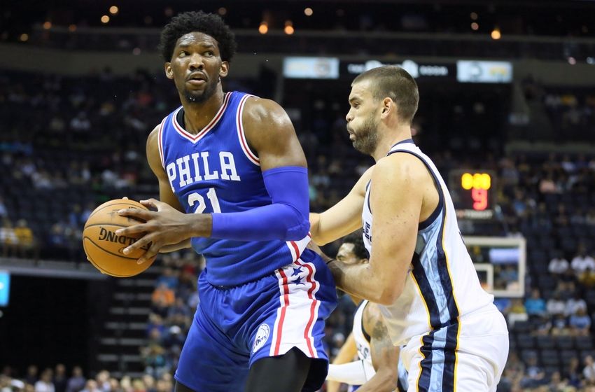 Oct 11, 2016; Memphis, TN, USA; Philadelphia 76ers center Joel Embiid (21) drives against Memphis Grizzlies center Marc Gasol (33) during the first quarter at FedExForum. Mandatory Credit: Nelson Chenault-USA TODAY Sports