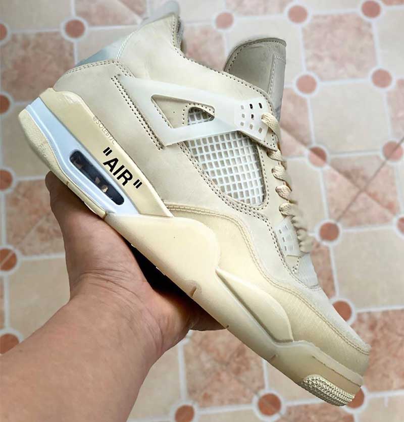 white and beige jordan 4s